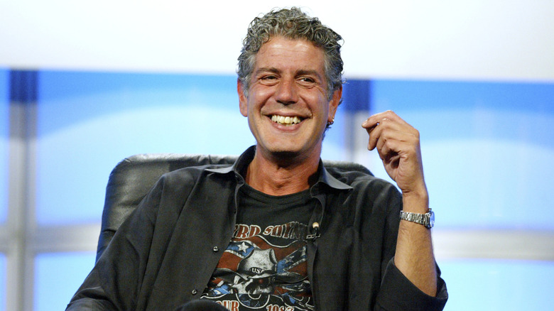 Anthony Bourdain sits on a panel