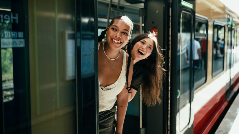 Happy travelers on a train