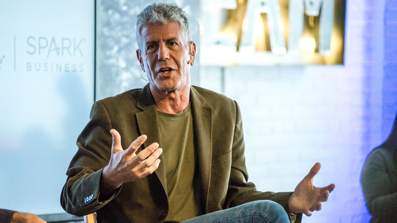 Anthony Bourdain giving a presentation