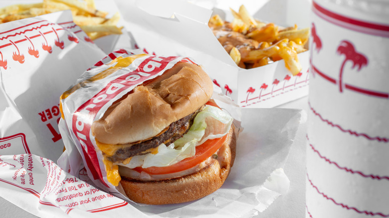 An In-N-Out Burger with french fries and a drink