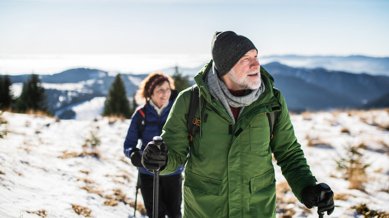 couple hiking in the snow