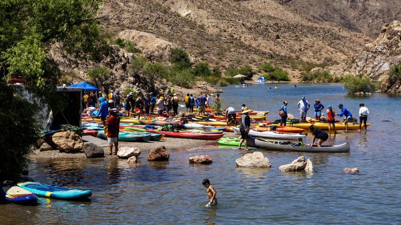 many visitors out at Willow Beach with kayaks and in the water