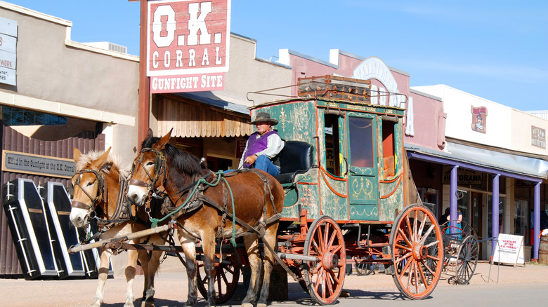 Stagecoach riding past the O.K. Corral