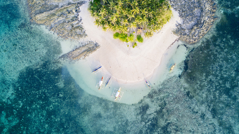 An aerial view of a small tropical island