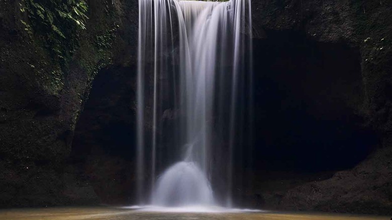 the base of Suwat Waterfall in Gianyar on the island of Bali in Indonesia