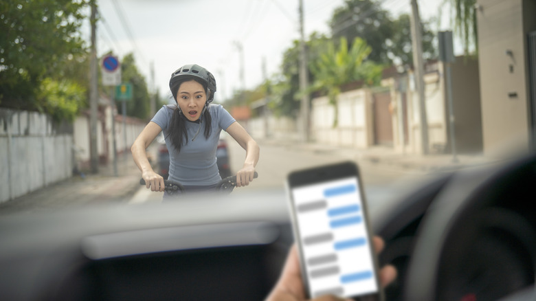 texting driver hitting cyclist