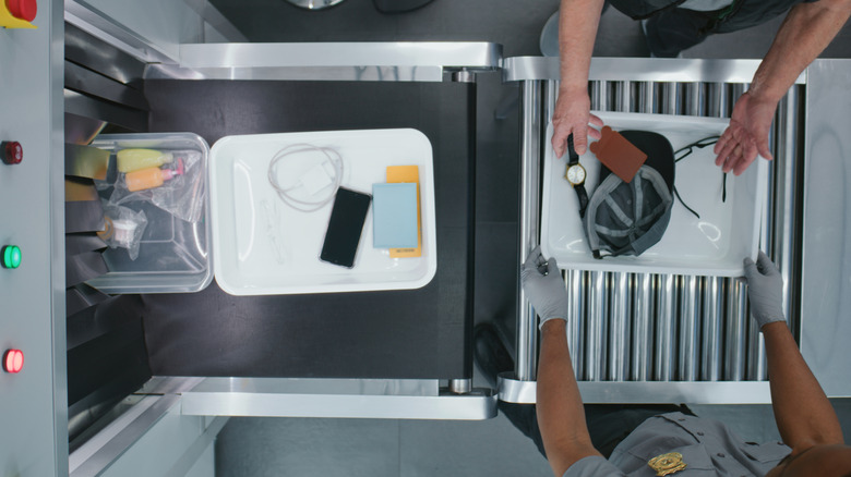 Overhead view of a TSA security check belt