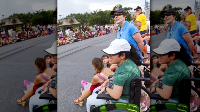 Spectators waiting for the parade at Disney World.
