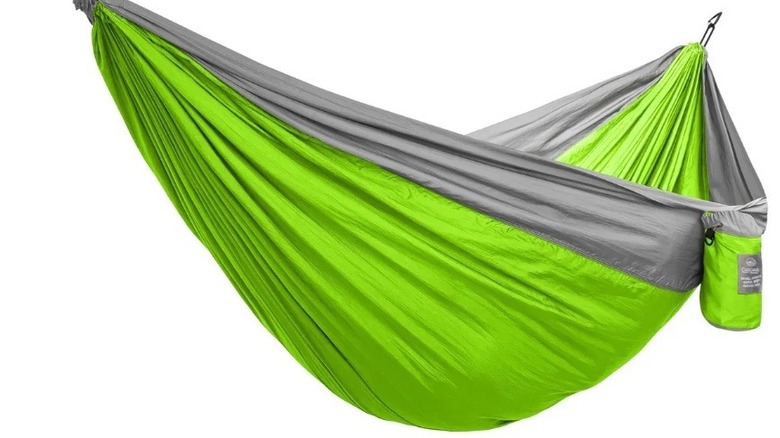 Cascade Oasis hammock set up on plain background