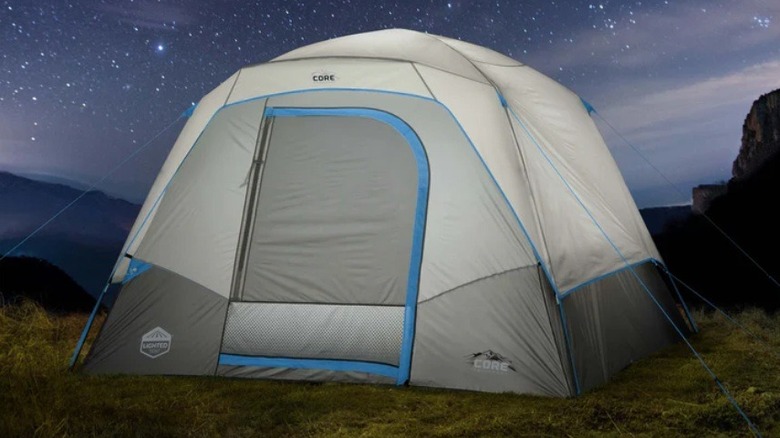 CORE tent pitched on grass under a starry night