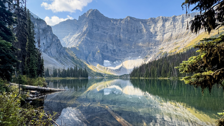mountains reflected in the still waters of Rawson Lake in Peter Lougheed Provincial Park