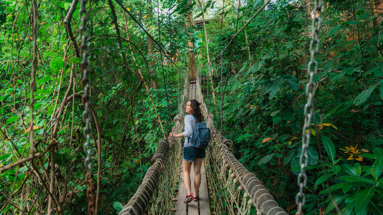 Woman hiking in forest