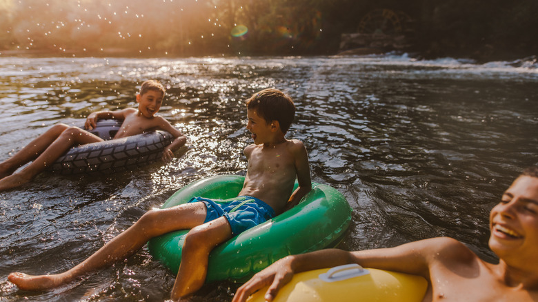 Youngsters tubing in summer