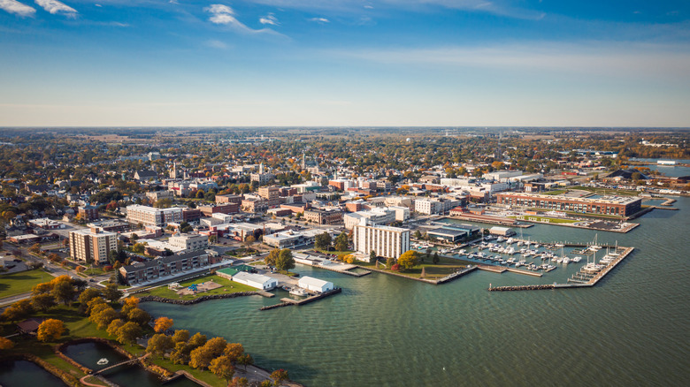 Aerial shot of a small city with a waterfront