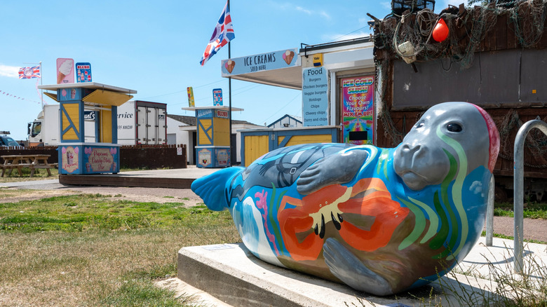 Seal sculpture outside seaside cafe