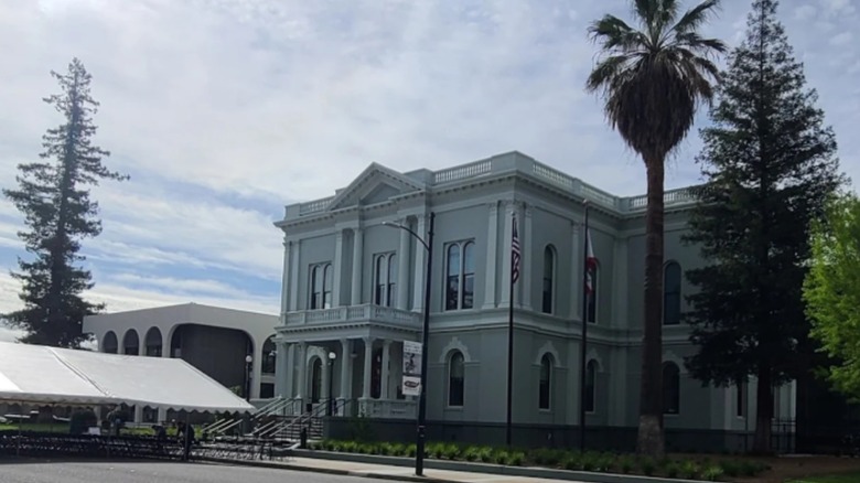 The gray, two-story Glenn County Courthouse built in the Neoclassical Revival style in Willows, California