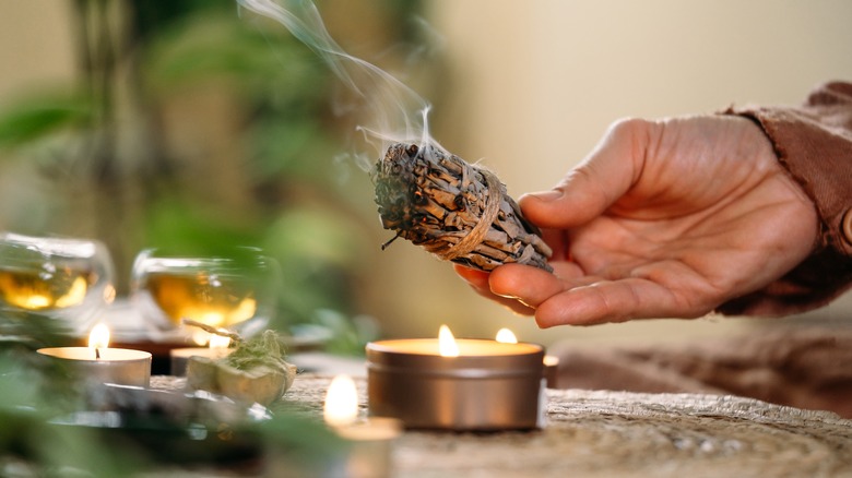 person burning sage