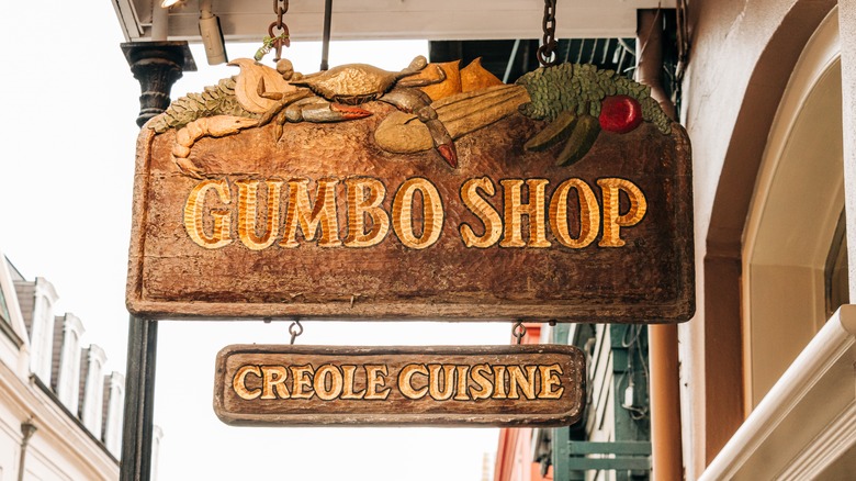 Gumbo Shop Creole Cuisine wooden sign