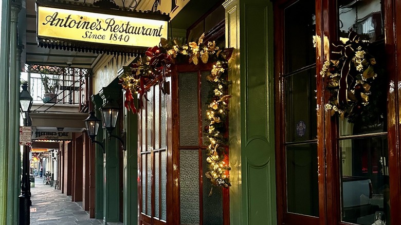 Antoine's Restaurant sign over pretty street