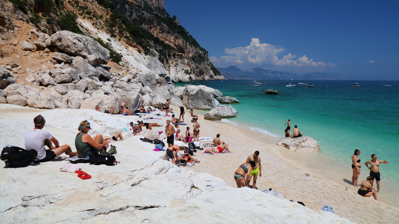 Tourist enjoying a day at Cala Goloritze