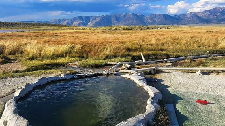 Hot spring overlooking mountains in California