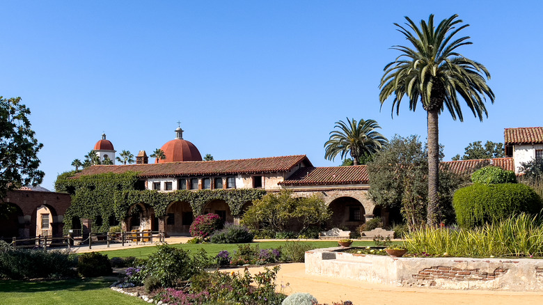 Main buildings and gardens of the historic Spanish mission in San Juan Capistrano.