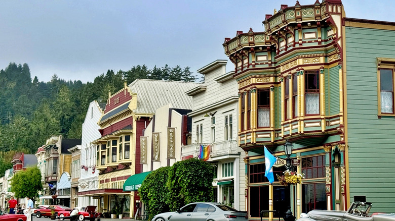 Classic cars lined up in front of the Victorian-era buildings in Ferndale