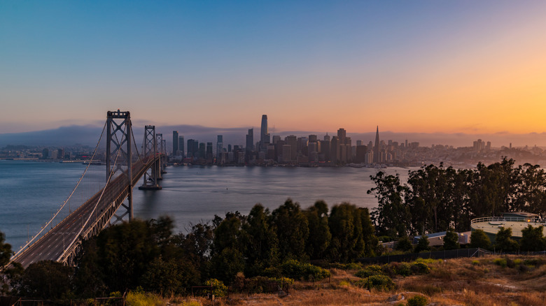 A sunset view of the San Francisco skyline from Yerba Buena Island