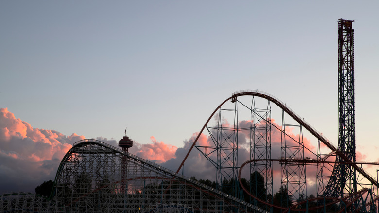 A sunset silhouette of Superman: Escape from Krypton at Six Flags Magic Mountain.