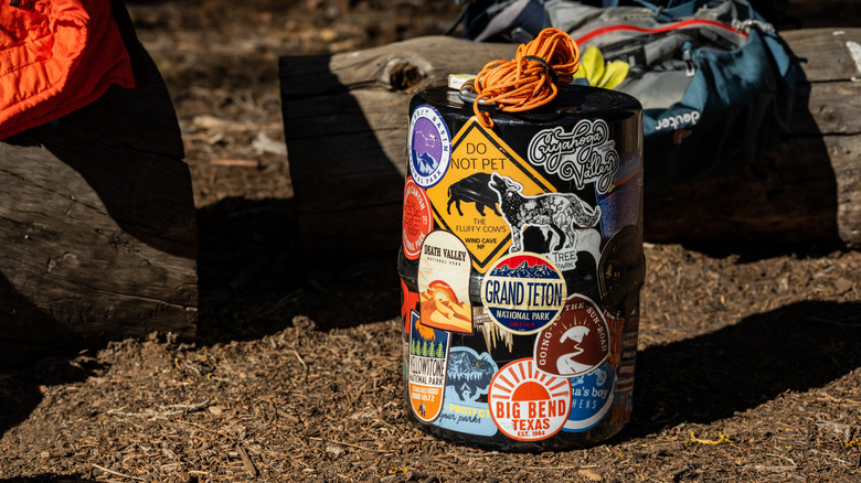 Bear Canister Covered In National Park Stickers.