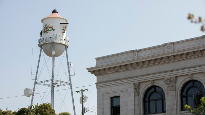 a colorful Swedish coffee pot water tower in the center of Kingsburg in Fresno County, California
