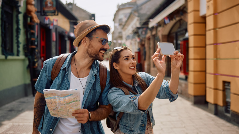 couple taking selfie on vacation