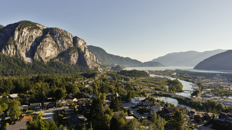 Mountains with lake, river, and town