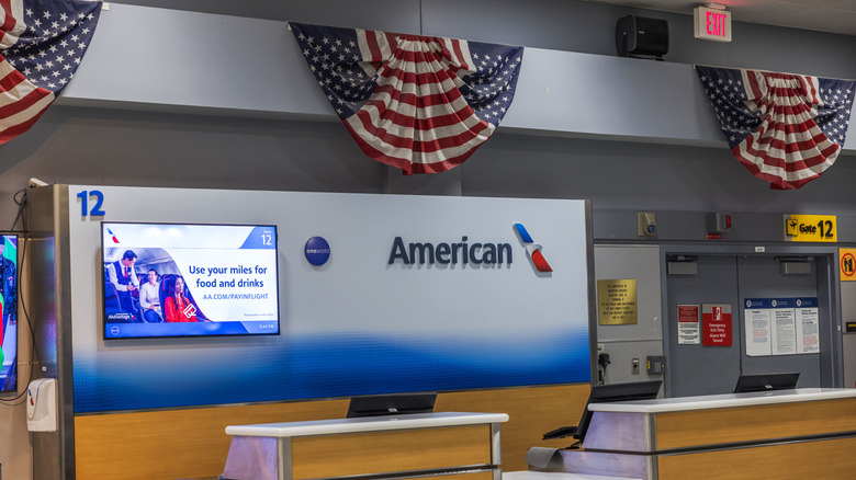 an American Airlines desk at the airport
