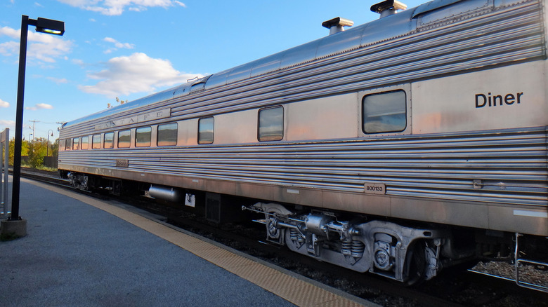 The Ethan Allen Express train idles at a platform