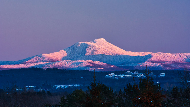 Snow-covered Camel's rises over a valley in Vermont