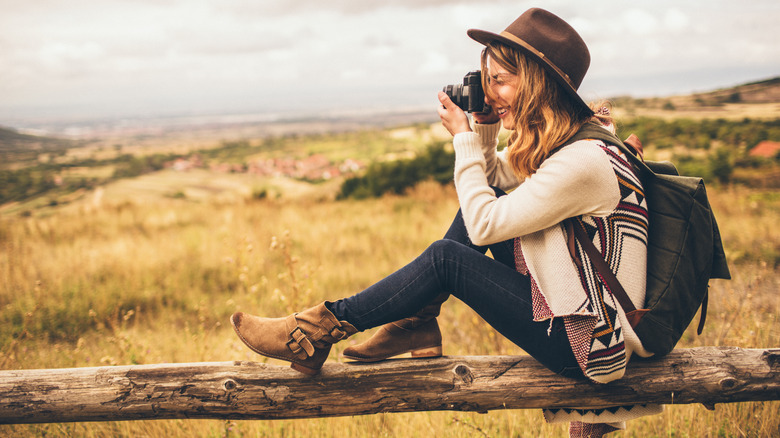 photographer outside in autumn