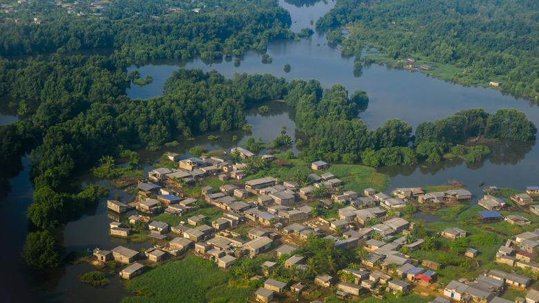 Aerial and morning view of low buildings in Mabanda, a swampy area in the western part of Douala, occupied by the local population.