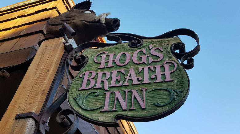 The Hog's Breath Inn sign.