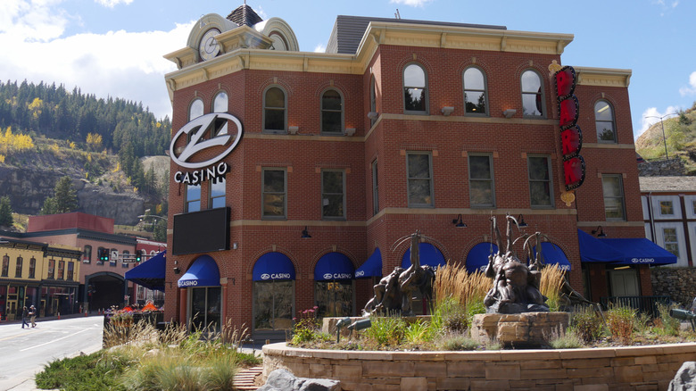 A Black Hawk brick casino building with arched windows