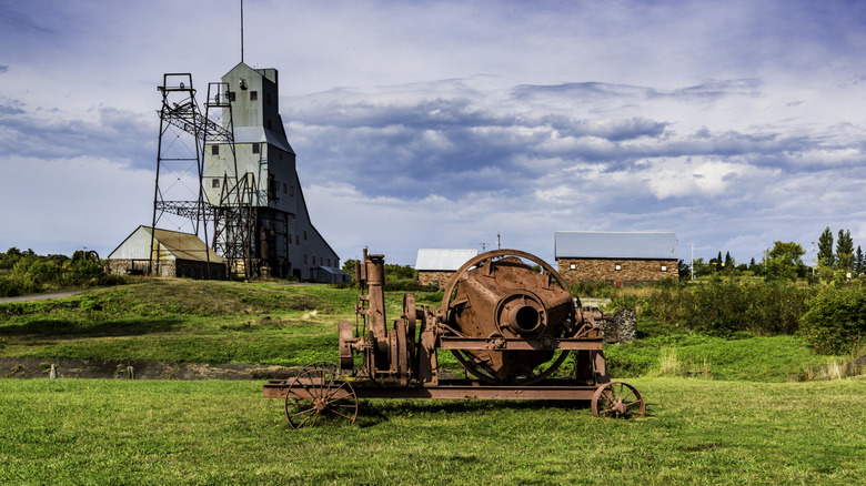 Copper mining machinery on a green field