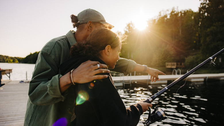 Two people fishing on a lake