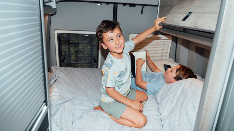 brothers in small camper van