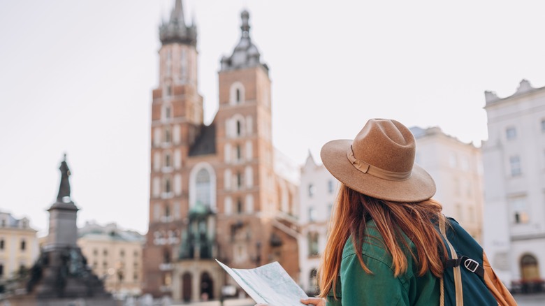 girl looking at map