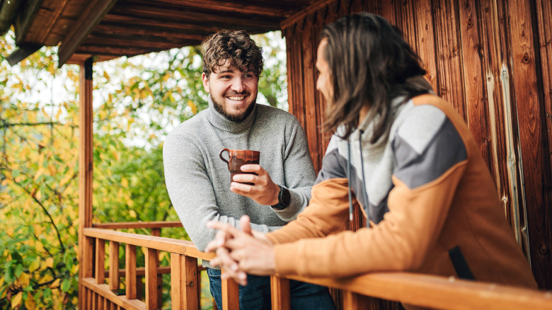 couple on cabin patio