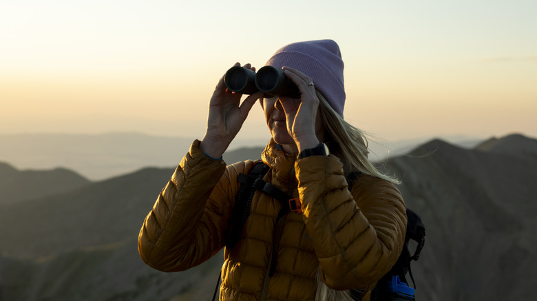 woman using binoculars