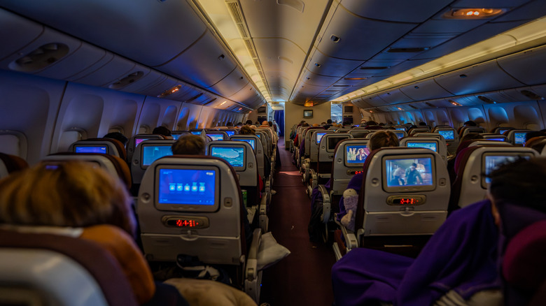 dark cabin on red-eye flight