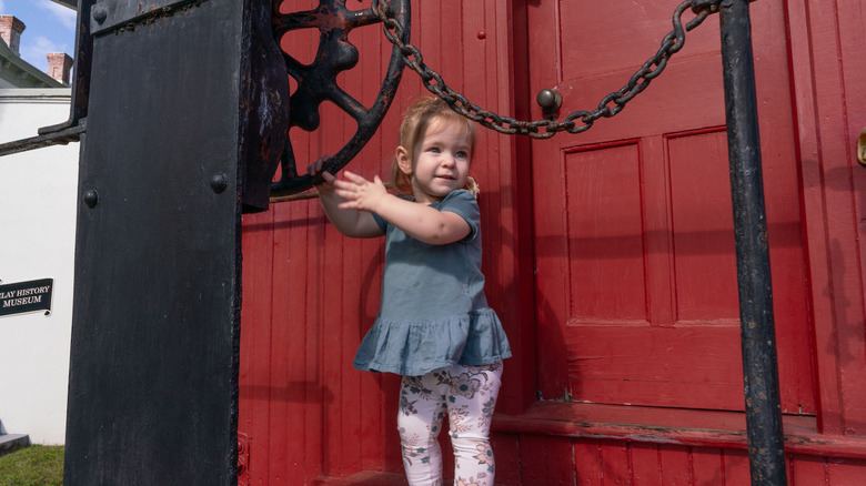 Child playing at a Clay County museum