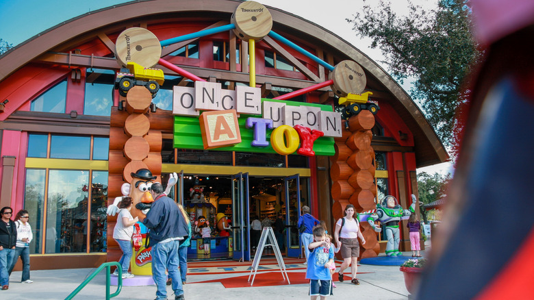 People at the entrance of a toy shop in Downtown Disney, Florida.