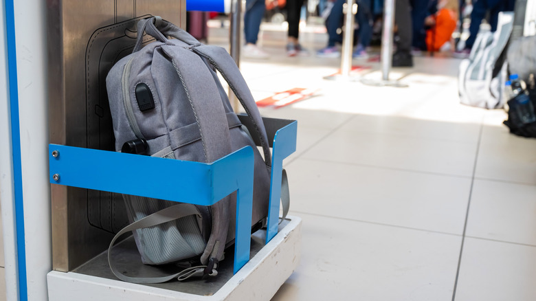 Baggage size checker with hand luggage at the airport